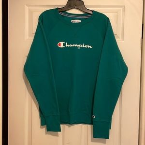 Champion sweatshirt. Women’s Size Large. Teal color with silk-screen logo